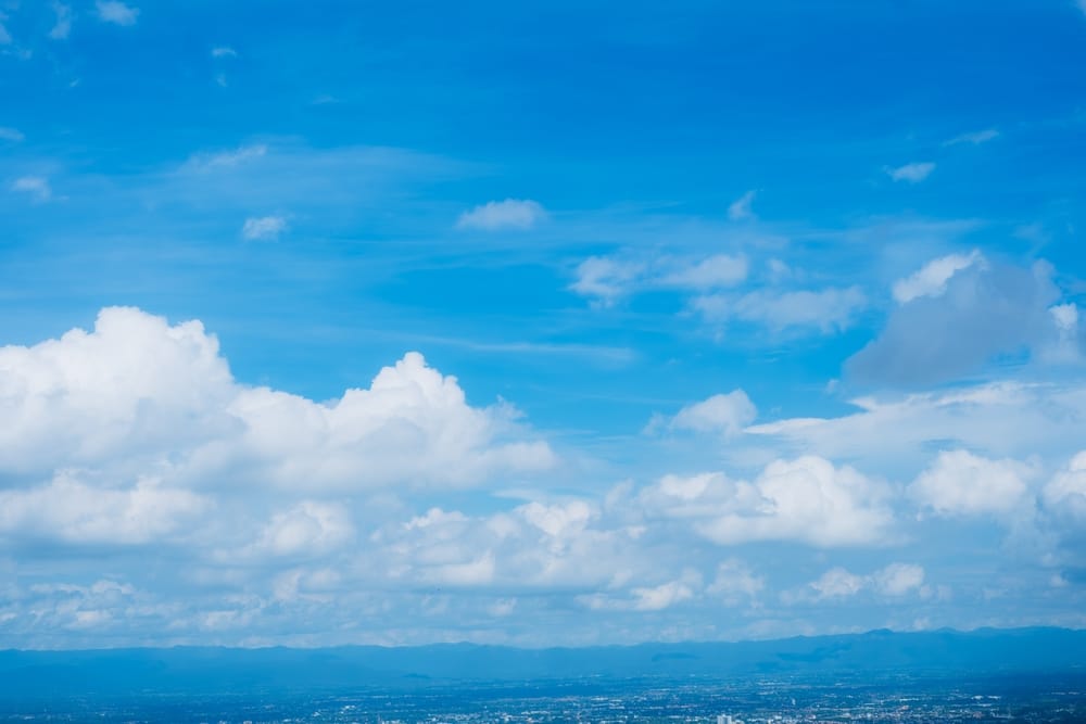 A view of blue and white painted clouds