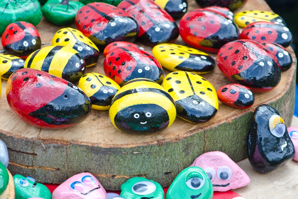 A view of lady bugs painted on rocks