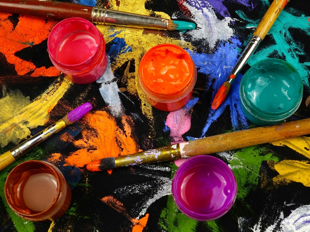 An overhead view of acrylic paints