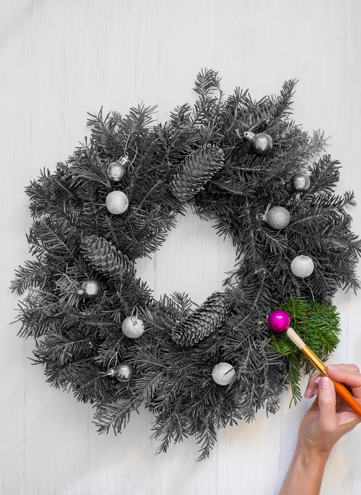 An overhead view of a christmas wreath painting