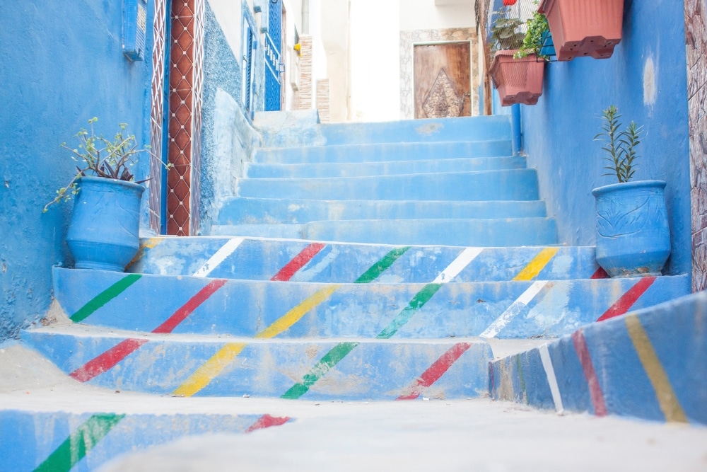 Painted Blue Stairs In A Traditional Alleyway