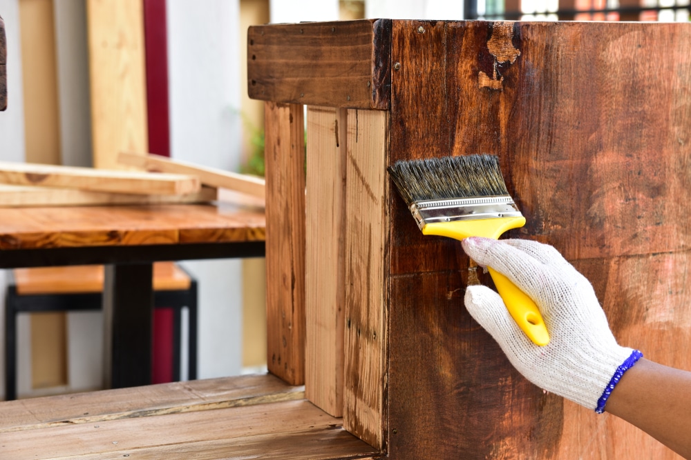 The Painter Uses The Lacquer Paint To The Wooden Furniture