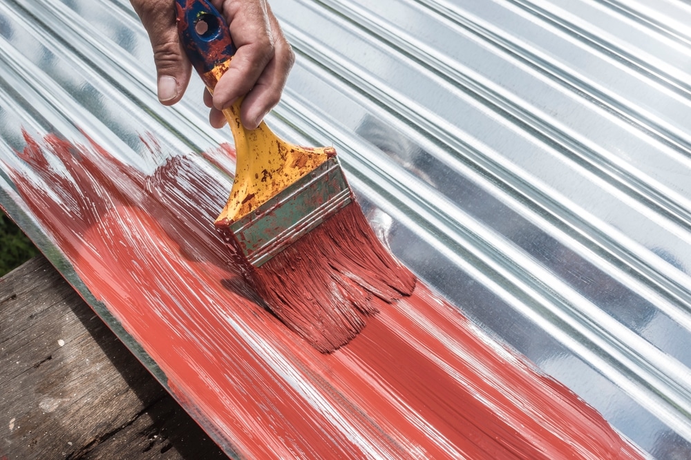 Painting The Surface Of A Sheet Of Galvanized Iron Or