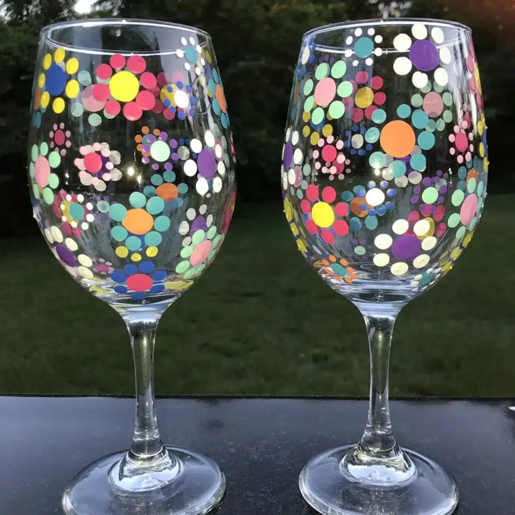 two floral painted wine glasses