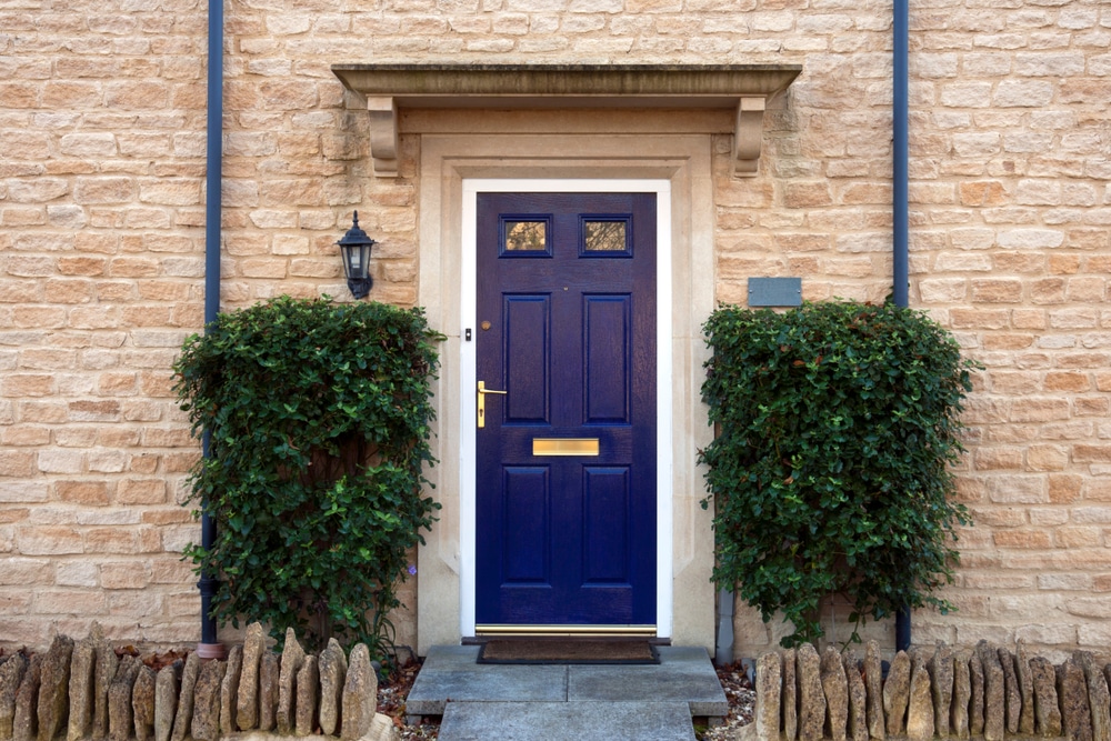 A view of a house front door painted blue