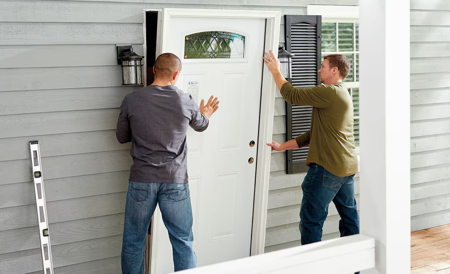 experts installing a door
