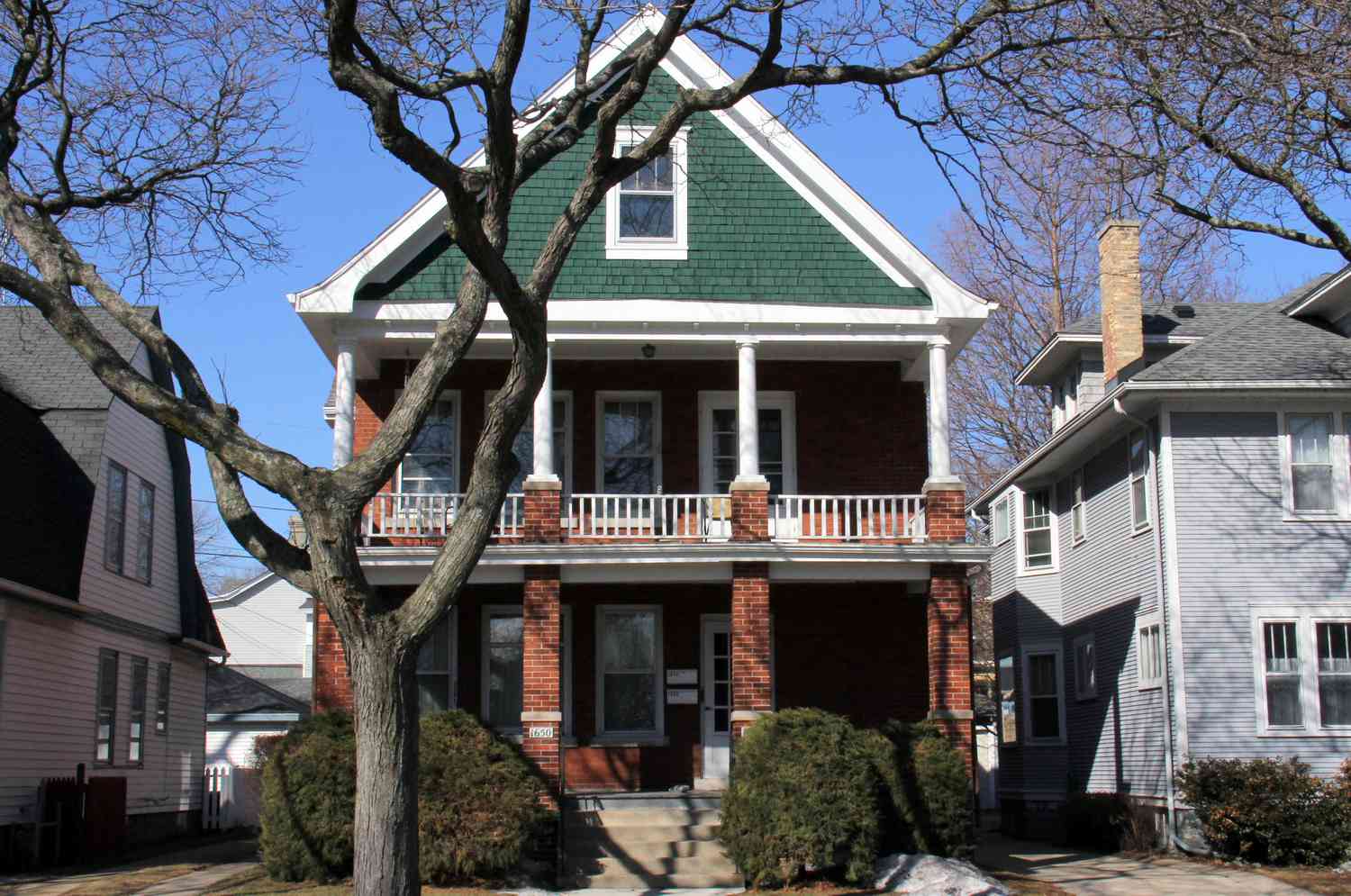 deep forest green roof on a red brick house deep forest green roof on a red brick house