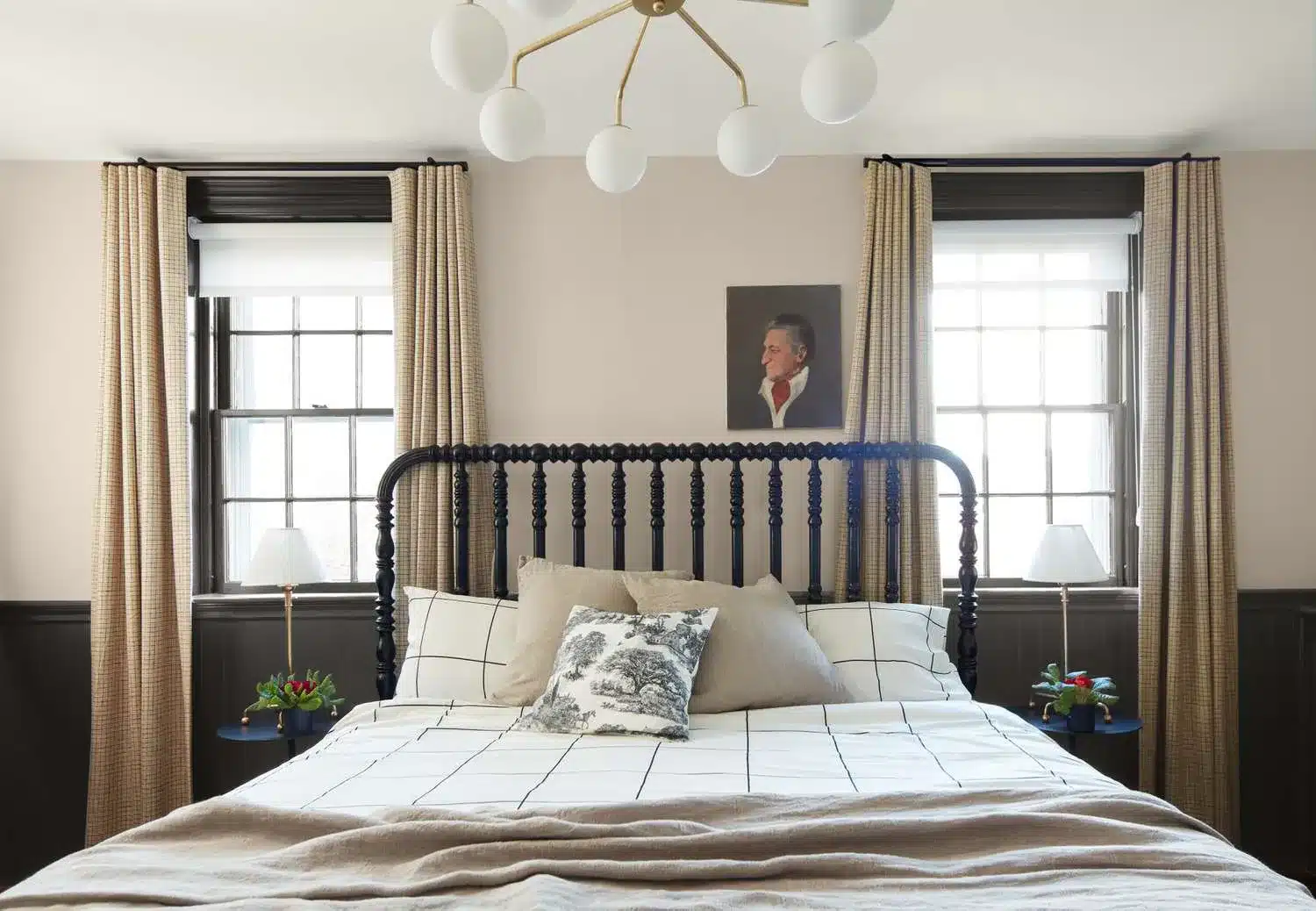 a bedroom with warm paint color on the wall zon