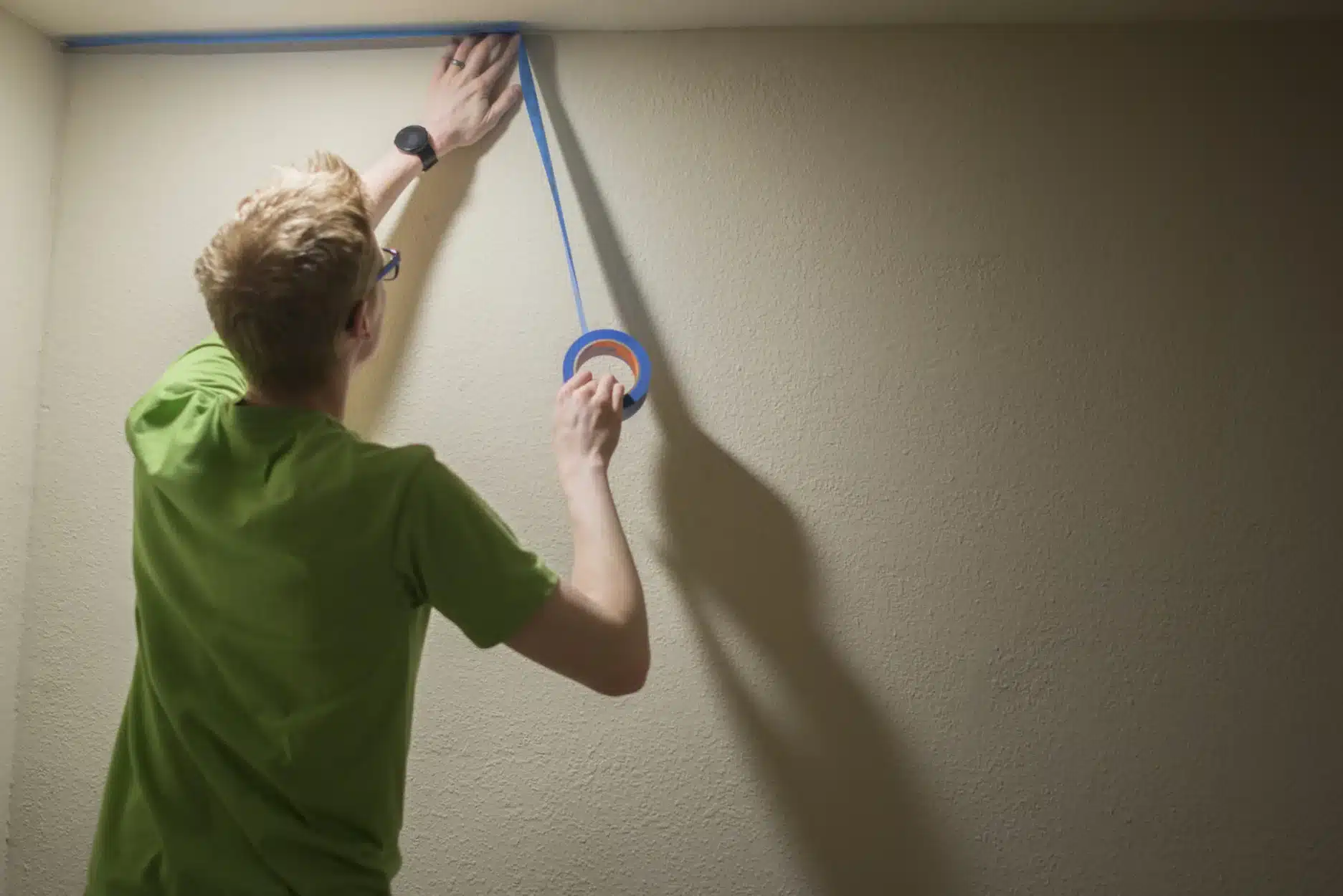 back of a room taping a room ( )