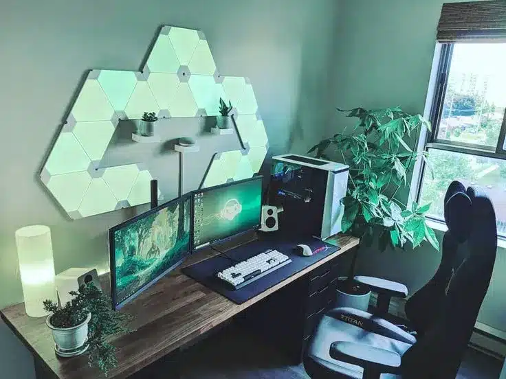 green walls in a gaming room - gaming pacs a chair and artwork displayed on walls