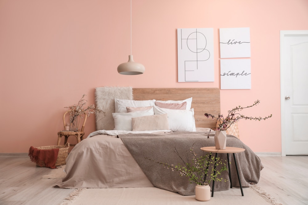 Interior Of Beautiful Modern Bedroom With Spring Flowers Interior Of Beautiful Modern Bedroom With Spring Flowers
