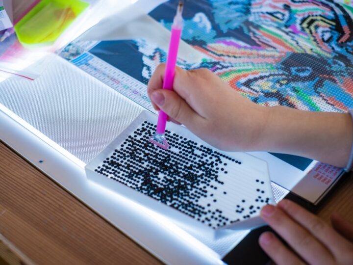 Little Girl Making Diamond Painting Or Pearl Mosaic Picture Colorful