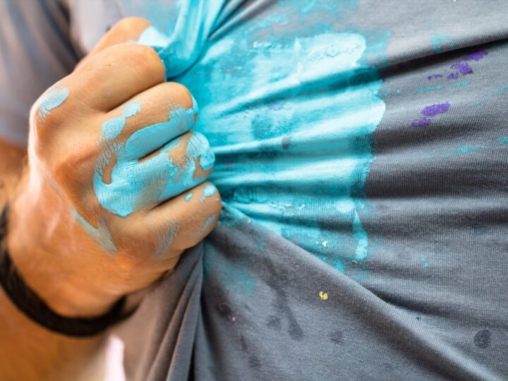 Man Hand and shirt Stained By A Blue Paint