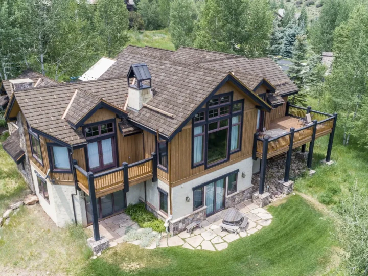 a beautiful house with brown roof