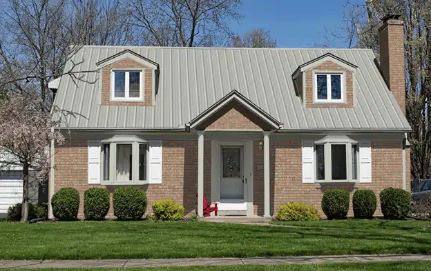 a very beautiful light gray roof color on a brown house
