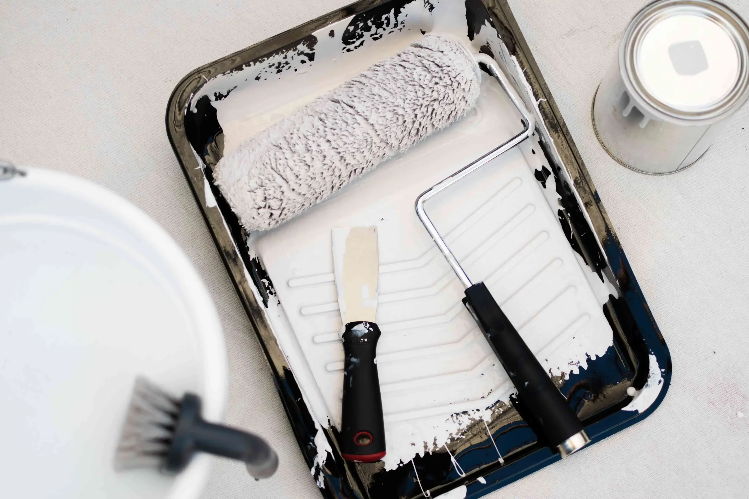 dirty paint roller in a tray dirty paint roller in a tray